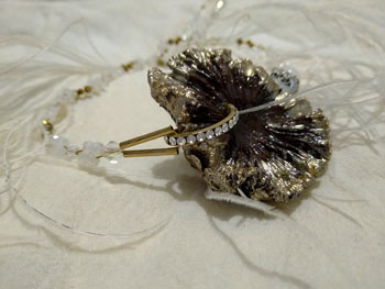 Collar flor plumas