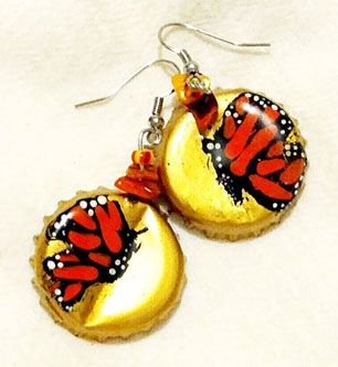 Aretes corcholata vuelo monarca